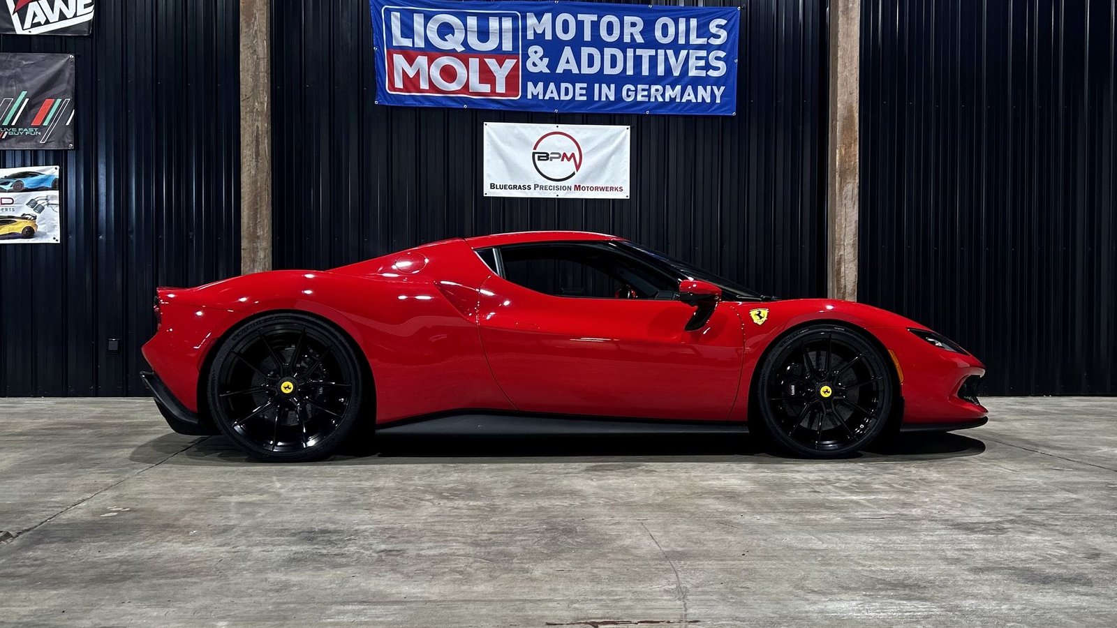Red Ferrari in the shop at Bluegrass Precision Motorwerks in Lexington, KY